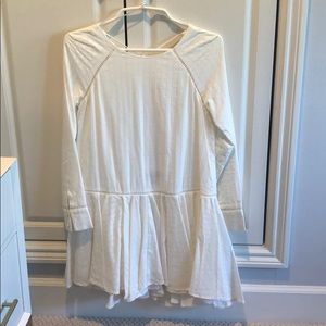 White sundress with open back and sleeves